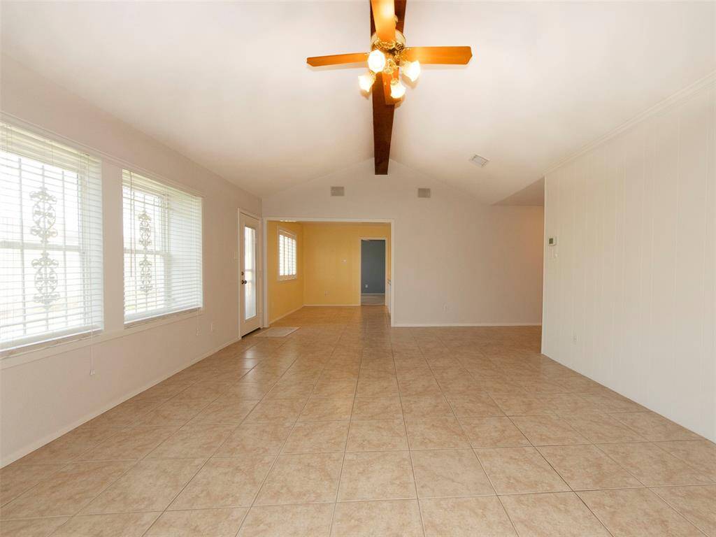Alternate view of the living room looking toward the breakfast room.