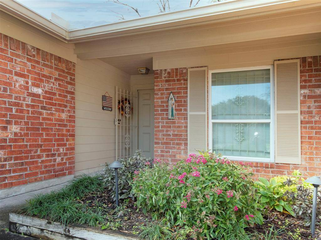 Established landscaping and gardens make this house feel like home.