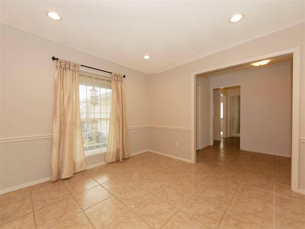 Formal dining room looking toward the entry foyer.