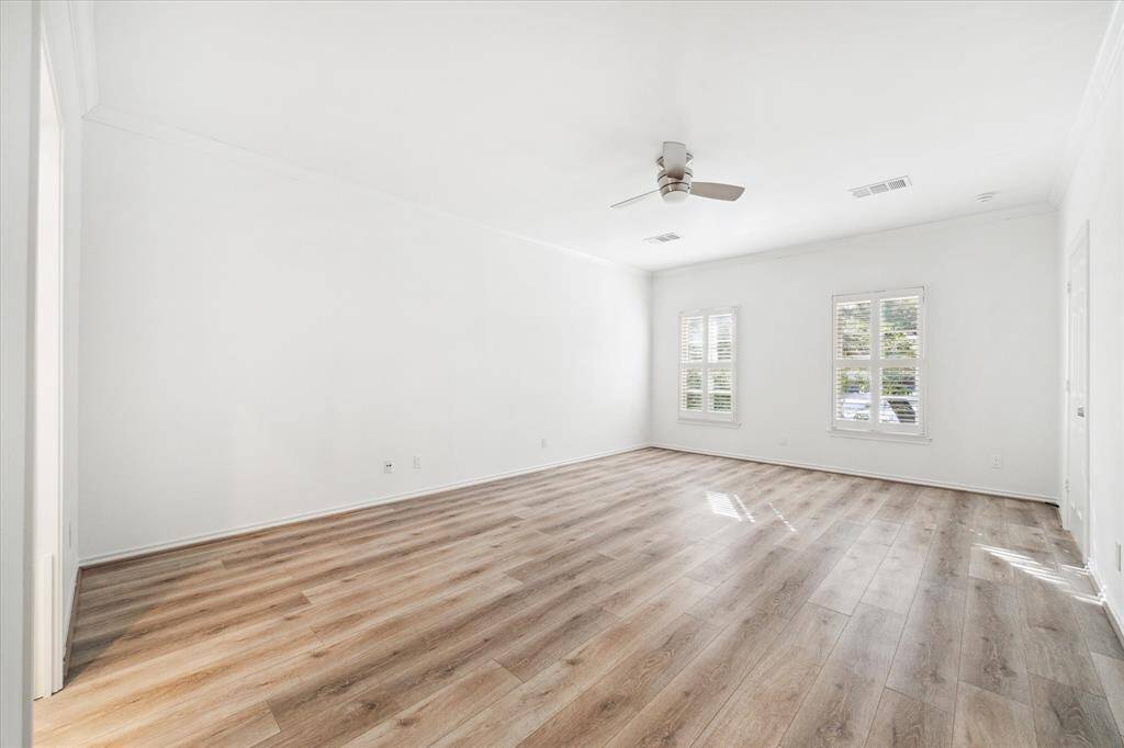 The primary bedroom has plenty of room to accommodate a sitting area or desk area if needed.