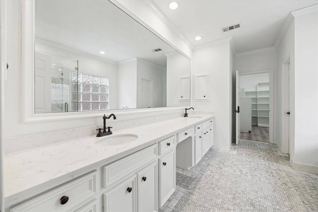Gorgeous, spa-like primary bath. Double sinks, an abundance of storage and counterspace.