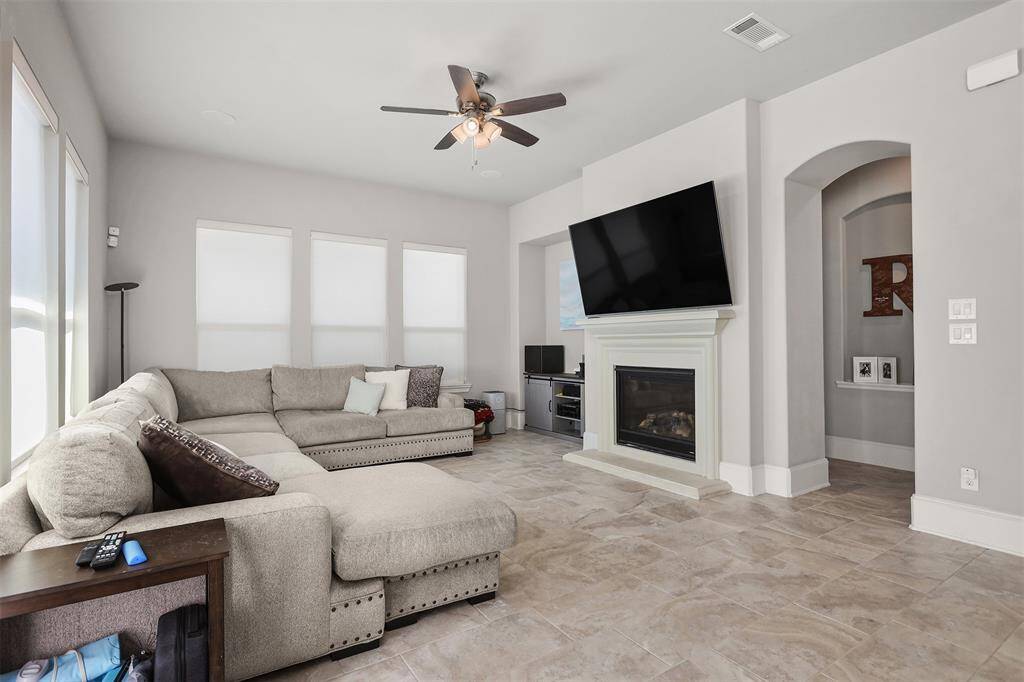 Cozy up in the living room to watch TV or sit by the fire.