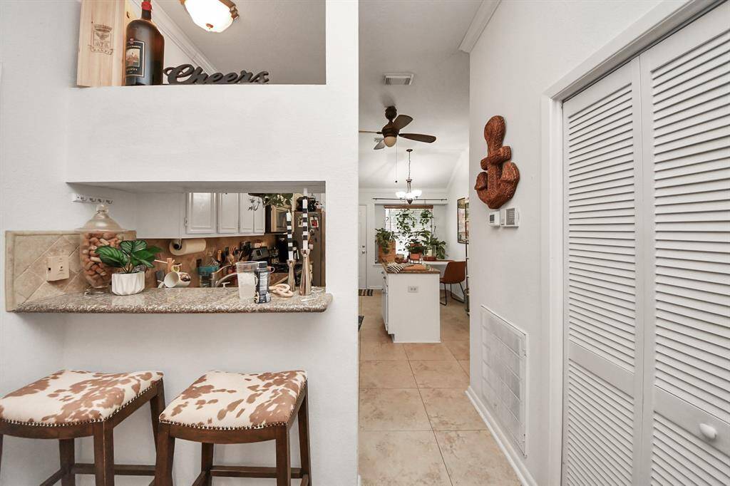 The living room leads to the kitchen.