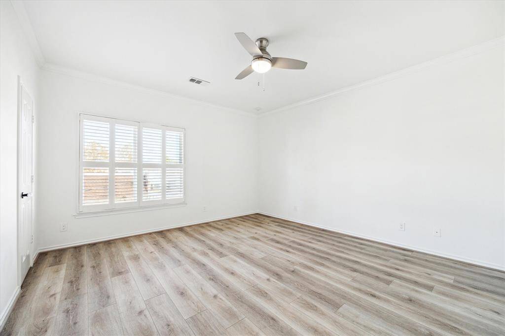 The secondary bedroom on the second floor.