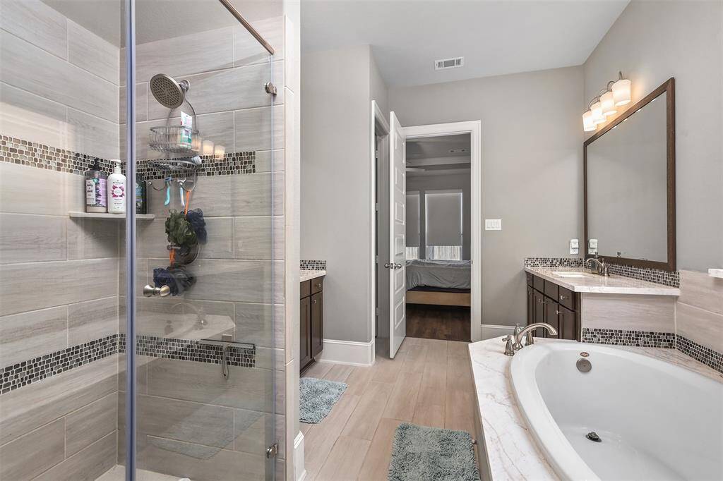 The grand bath will be your relaxing oasis and don't miss the giant closet.