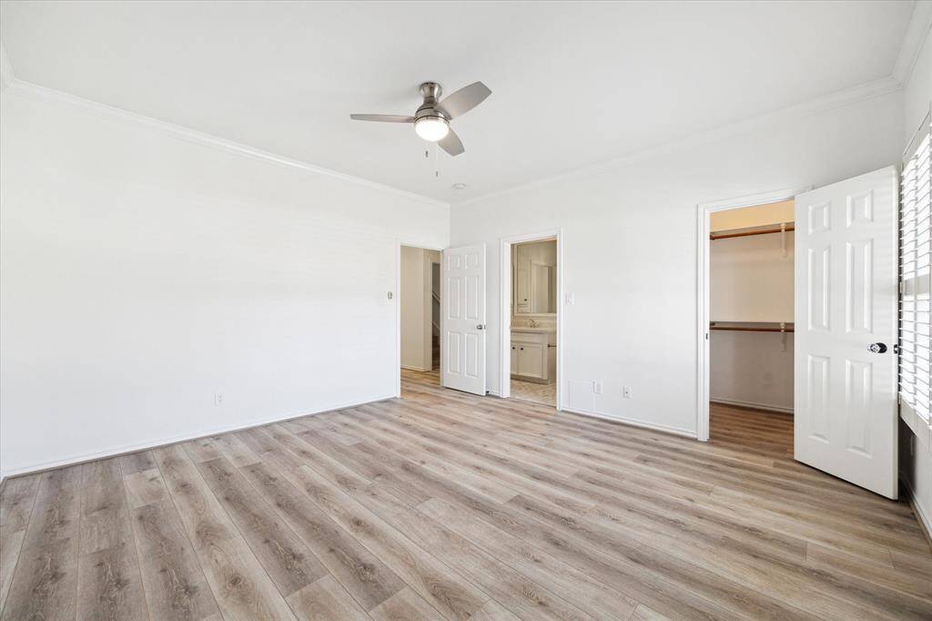 Another view of the secondary bedroom on the second floor, with generously-sized closet and access to the hall bath.