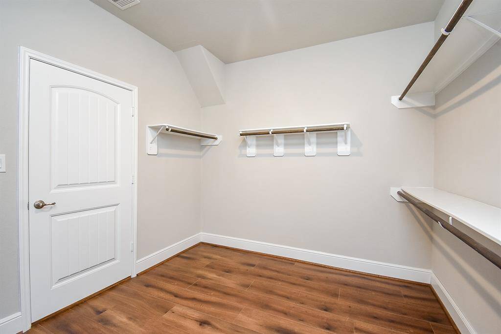 Experience seamless convenience with the spacious walk-in closet connected to both the ensuite bath and laundry area.