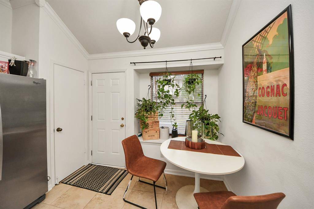 The breakfast room features awindow with views in your backyardnext to the back door.