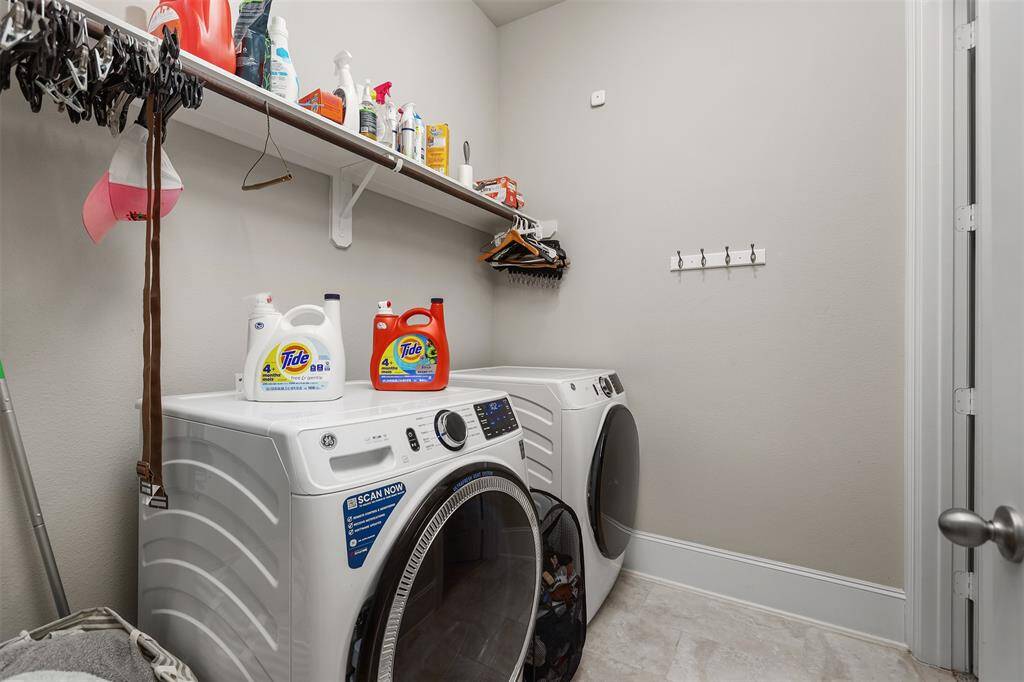 Convenient access from the master bedroom or the hallway to second bedrooms makes laundry day easy.