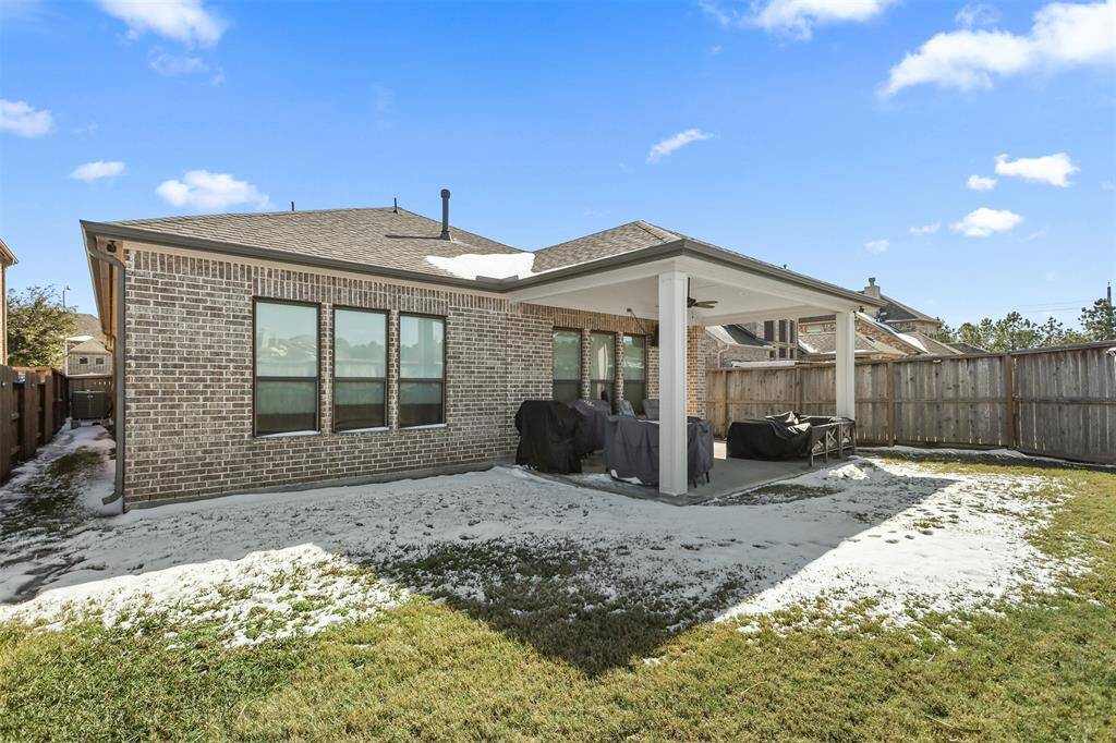 Large, covered patio will be the evening spot to hang out in the quiet backyard.