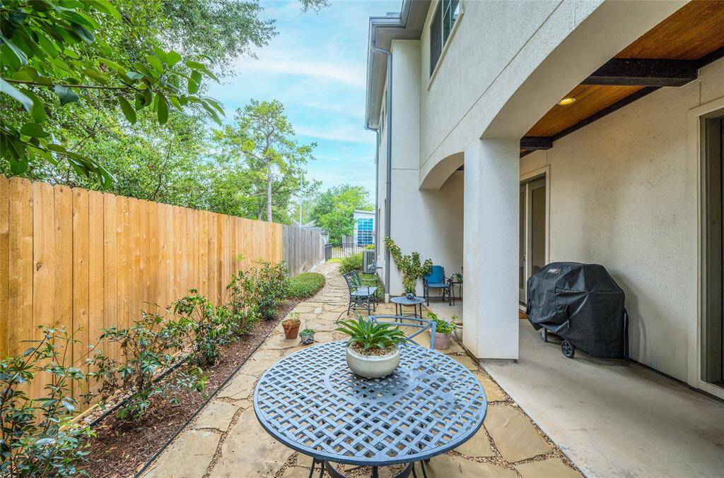 Another view of covered patio and low maintenance yard