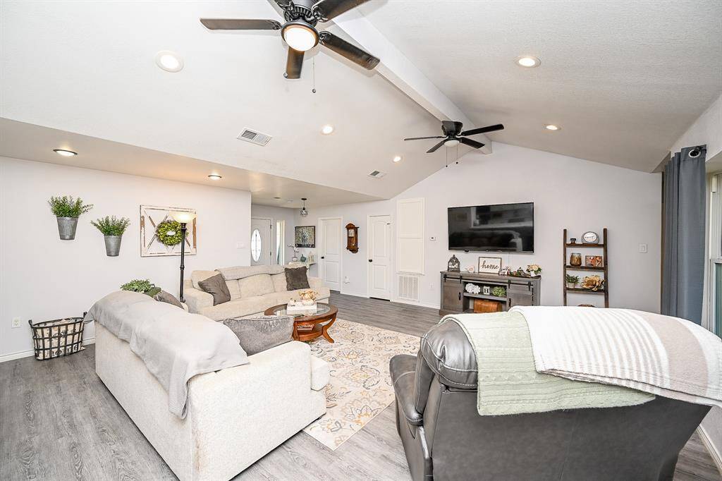 The living room has all so much natural lighting.