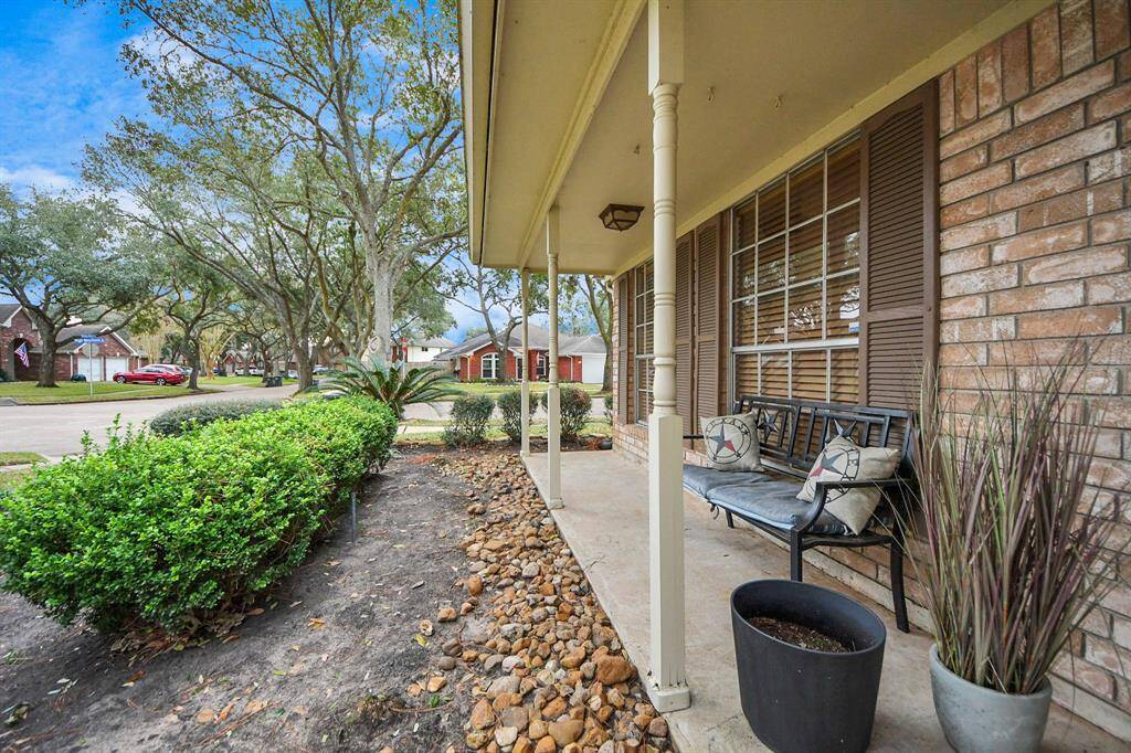 Approaching the front door you will see the covered front porch perfect for a sitting area.