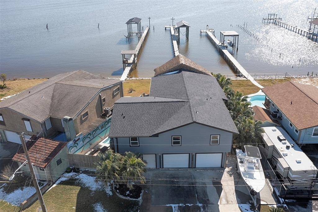 Aerial view showcasing your private waterfront home with a private dock.