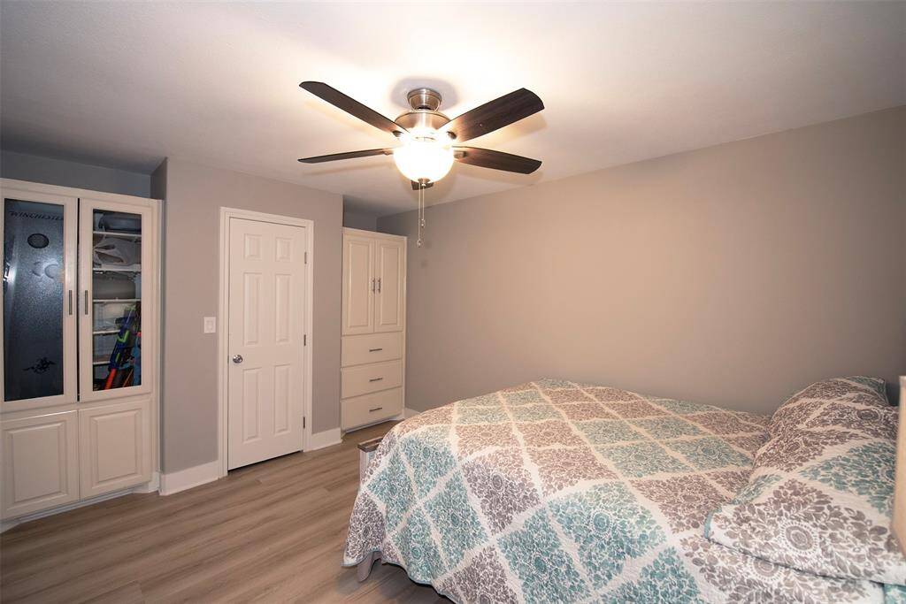 This room features exceptional built-in storage cabinets.