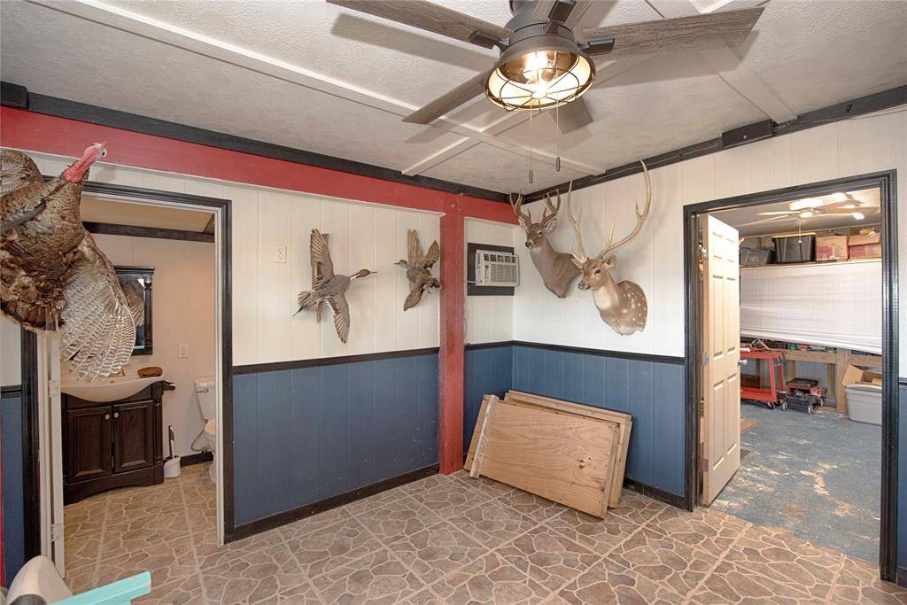 Cozy, climate-controlled flex room with a full bathroom close to pool.