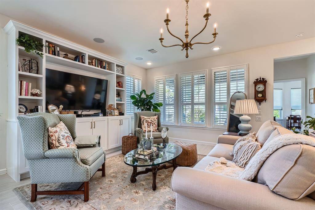 Lots of light and windows throughout the home with custom plantation shutters