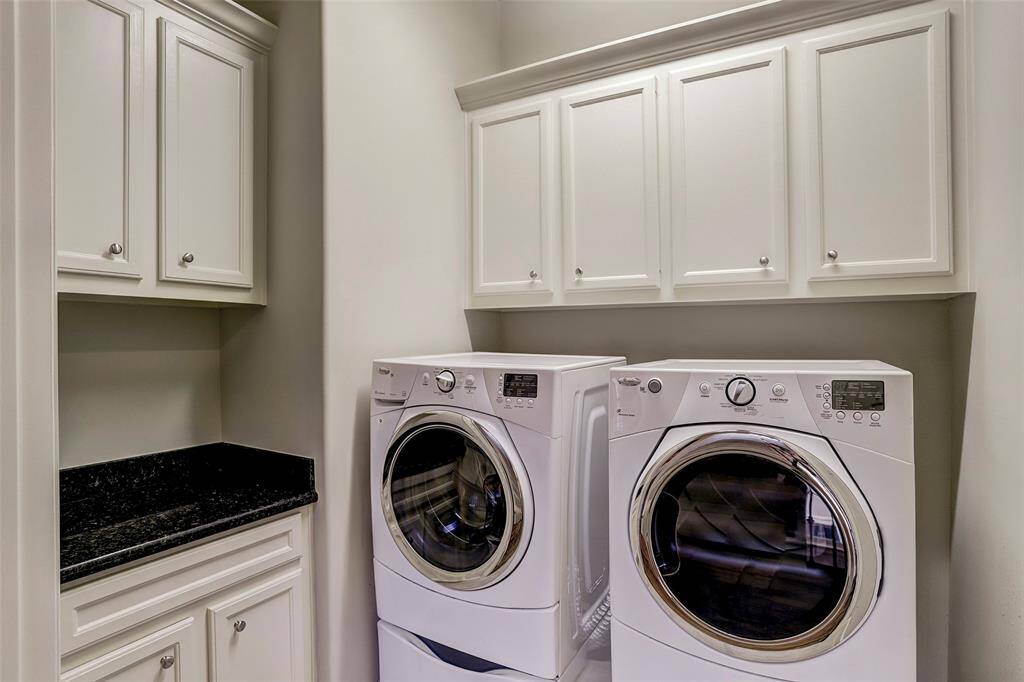 A utility room next to the bedrooms with washer and dryer means no more lugging laundry up and down stairs.