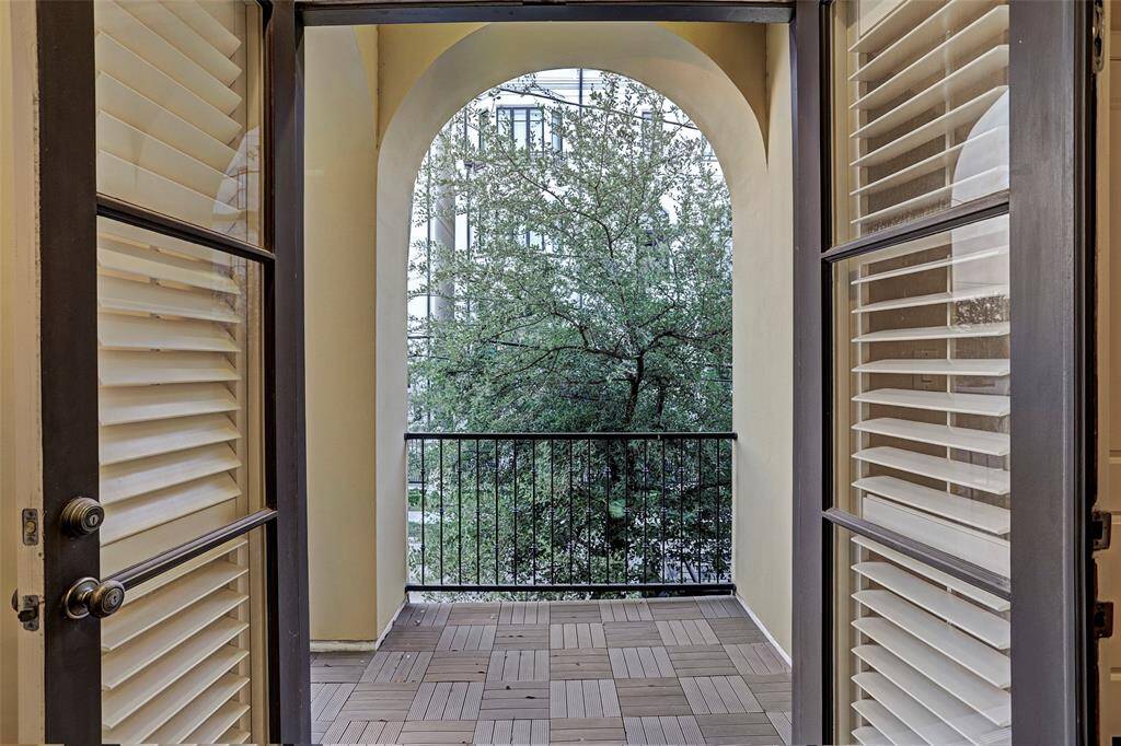 Enjoy coffee or cocktails on the balcony as an extension to your living space with treetop views.