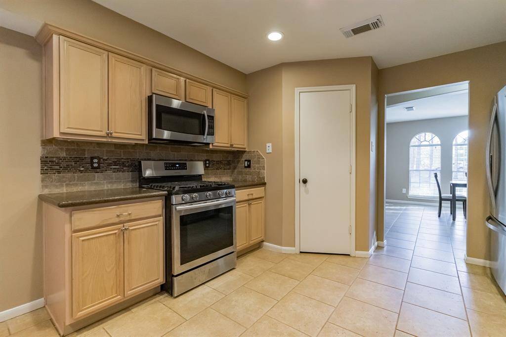 Gas stove/convection oven, built in microwave and large pantry.