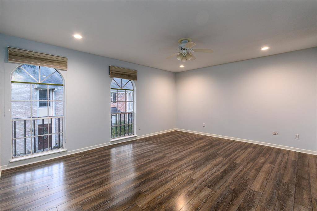 Beautiful flooring & recessed lighting enhances the ambiance in the primary suite.