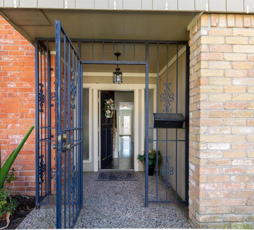 Gated entry to front porch.