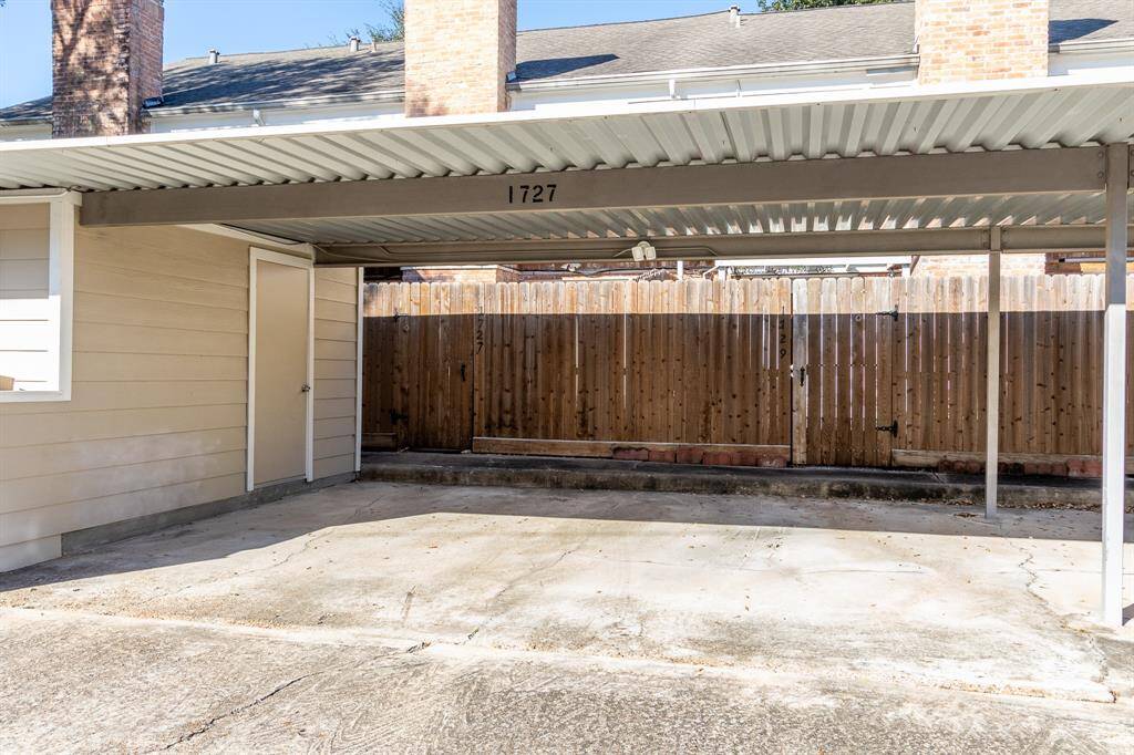 Views of the covered parking spots and storage.