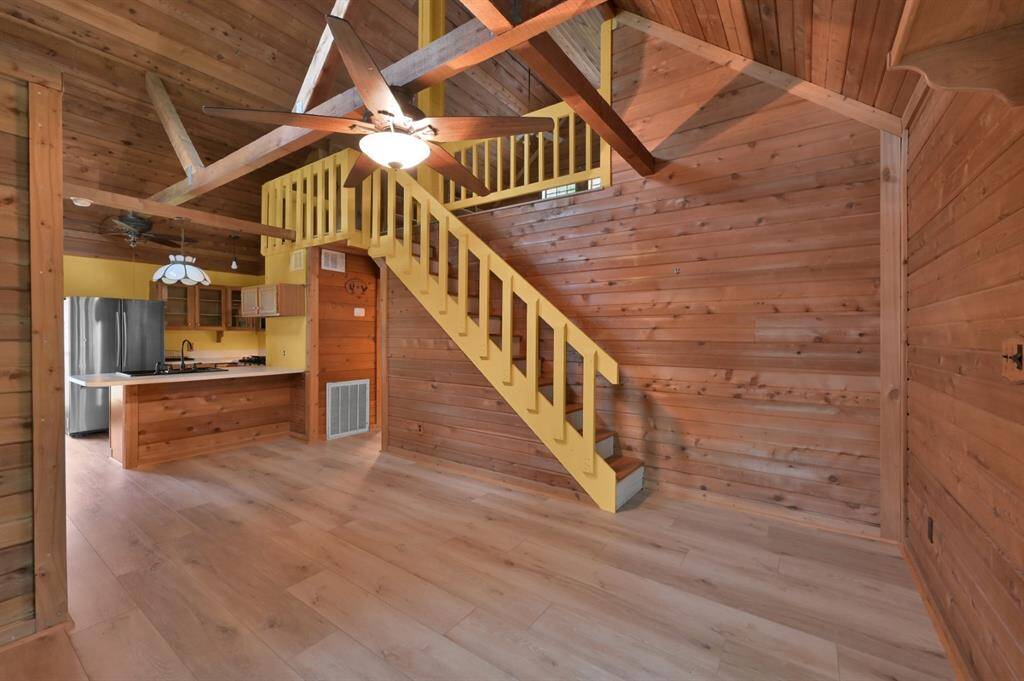 Main living is on the second floor with stairs to a loft!
