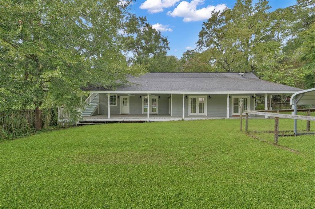Pool House Porch has a grassy area so spectators can watch the football game or swimmers.