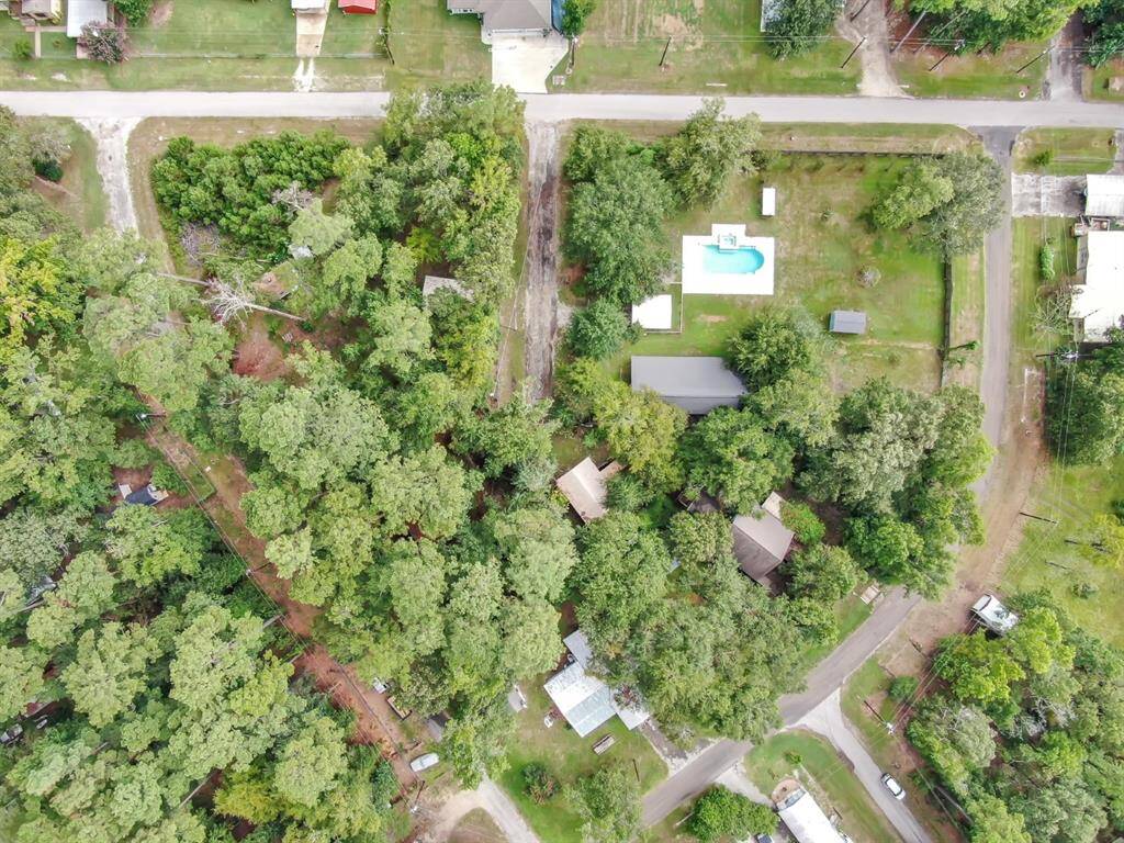 Aerial footage shows the 14 lots, houses, pool, etc.