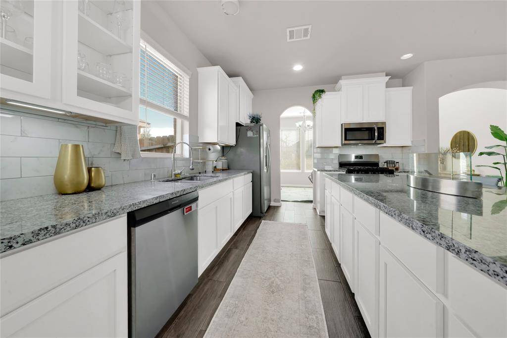 Opposite view of oversized kitchen