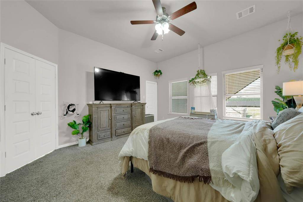 Primary suite with 2 walk in closets