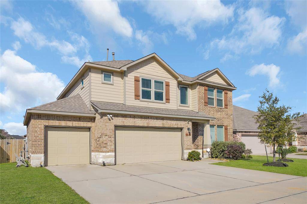 3 Car garage and doublewide driveway