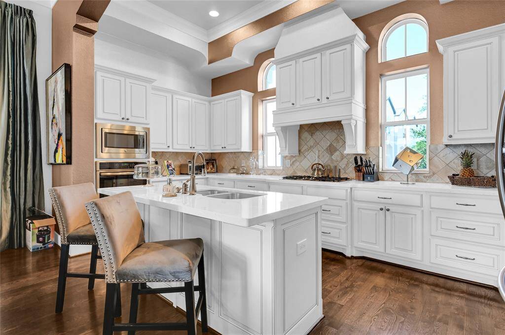 Chef's dream kitchen with Island, and an abundance of cabinets and counter-space