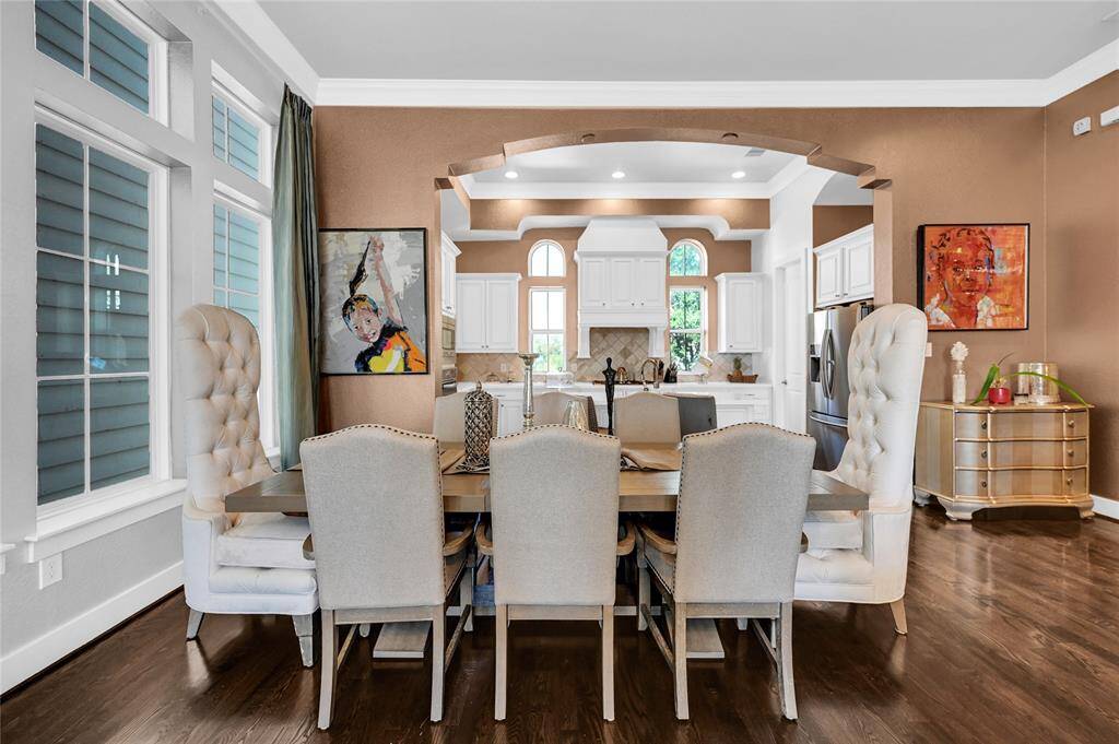 Spacious dining area seating for 8.  Hardwoods throughout