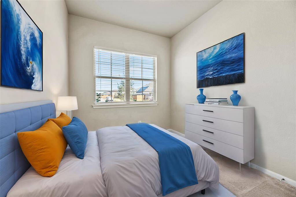 Your second bedroom offers a generous and inviting space.