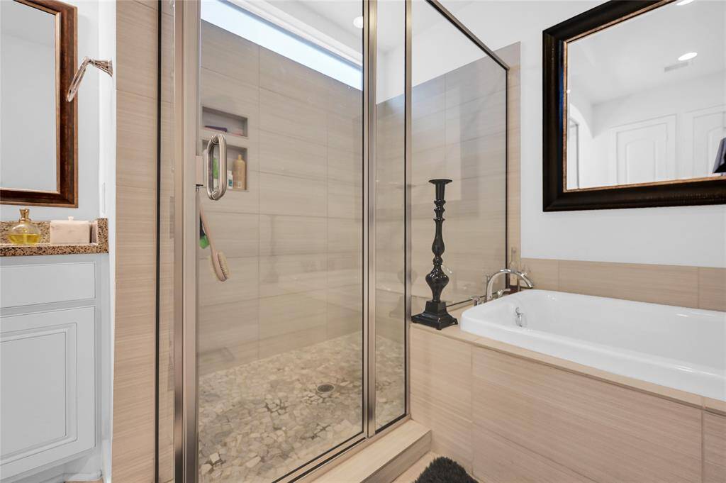 Shower has benh seating for two..