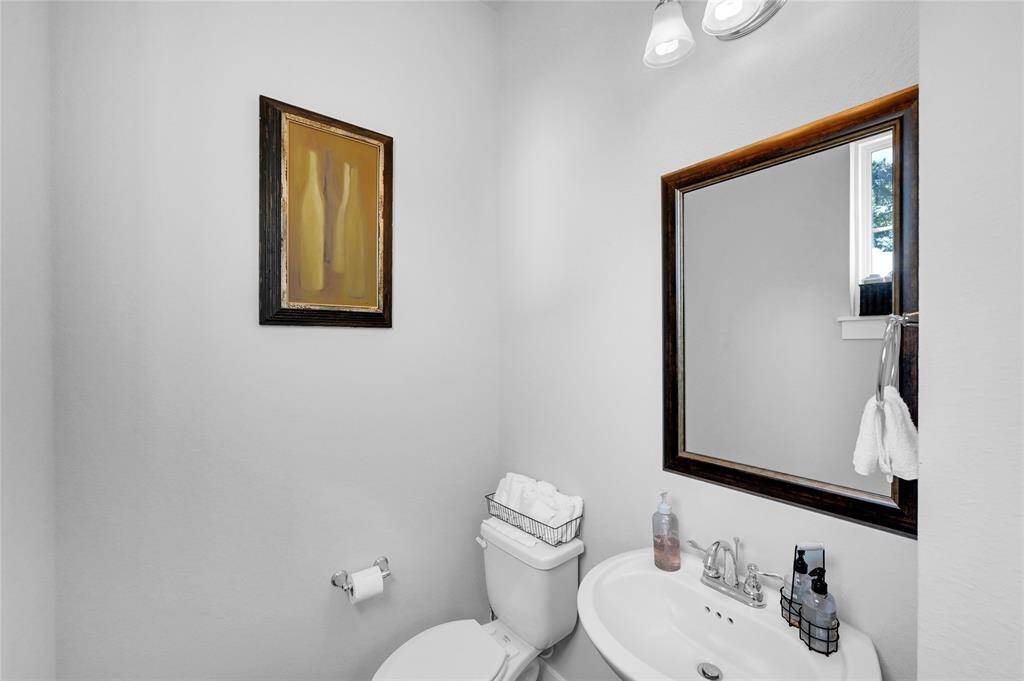 Half bath on the second level near great room