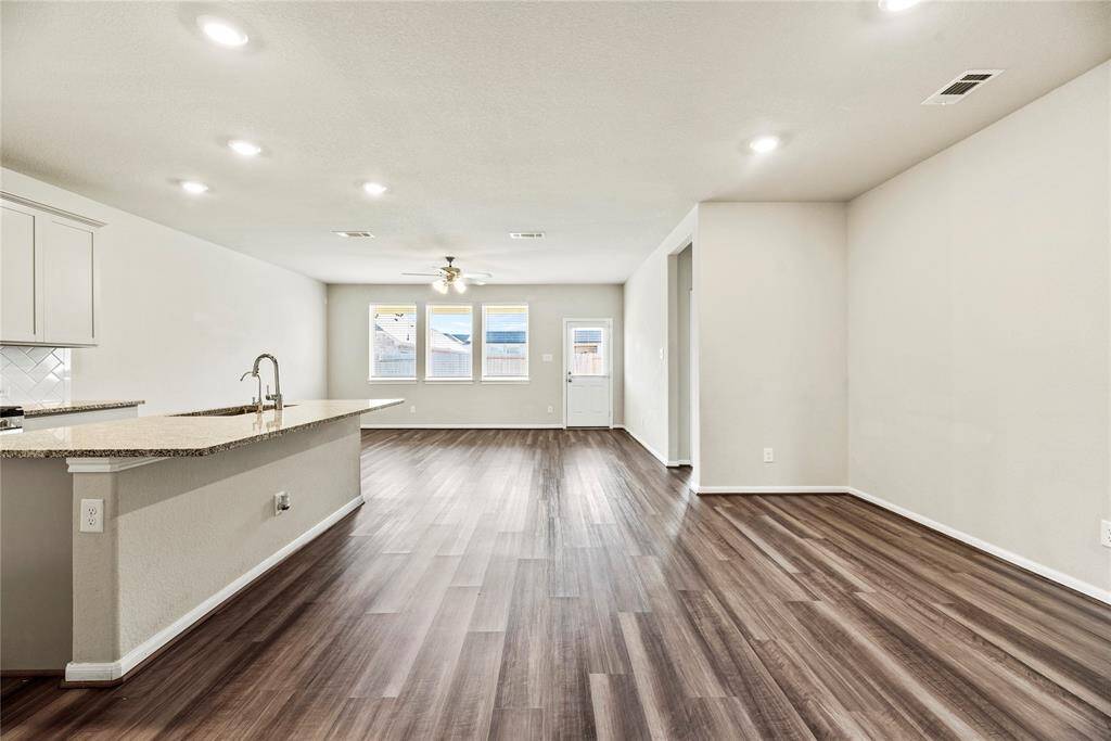 The open floorplan keeps everyone together and makes the space feel huge.