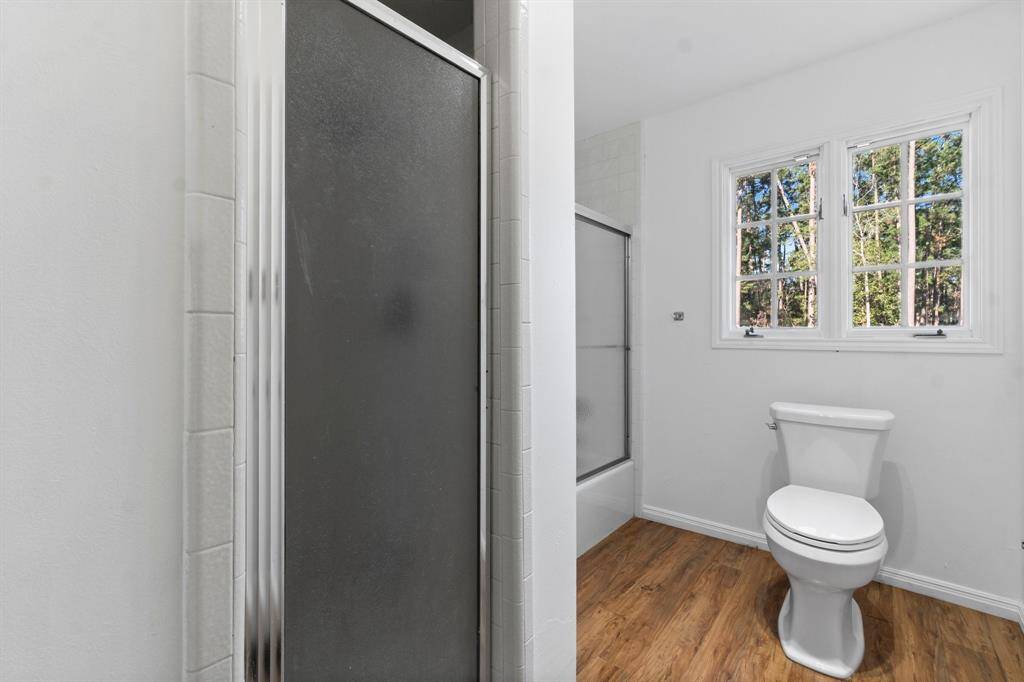 Primary bathroom has a stand-alone shower and a tub/shower combo.