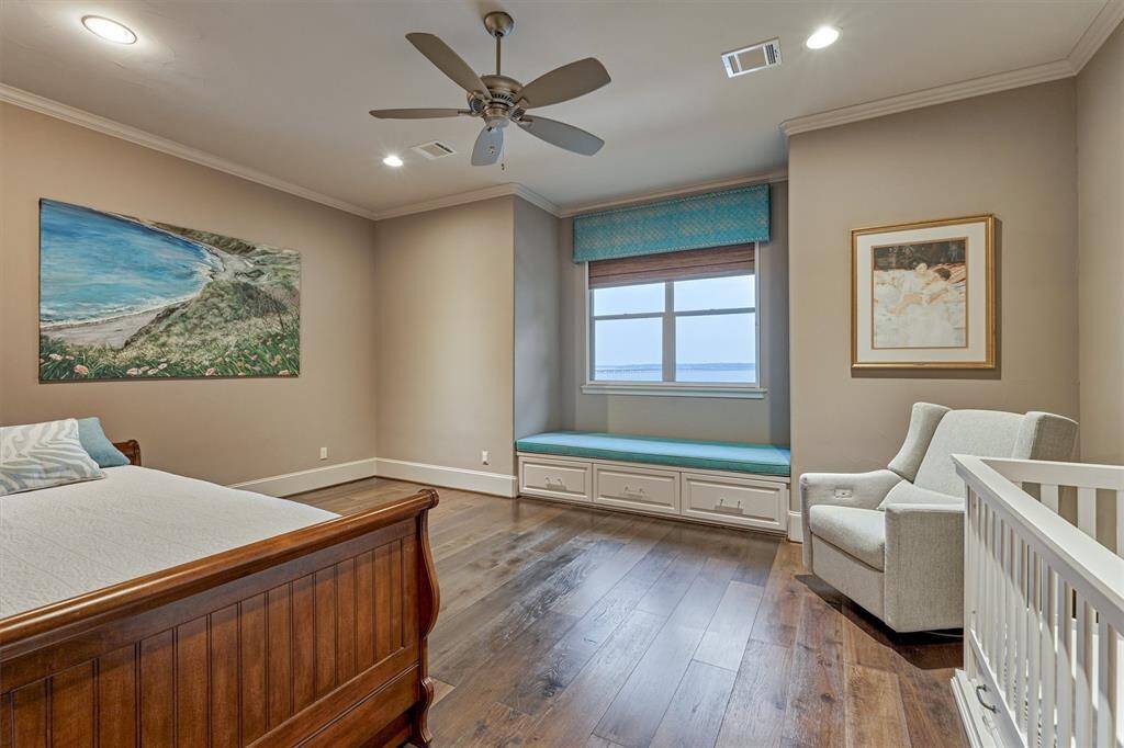 The fourth bedroom is on the second floor and also offers great views of Lake Conroe. This room also has blackout shades, a large closet and ensuite bath.