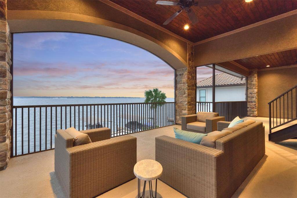 The second floor office and game room have access to the balcony, which is large enough for several seating areas.