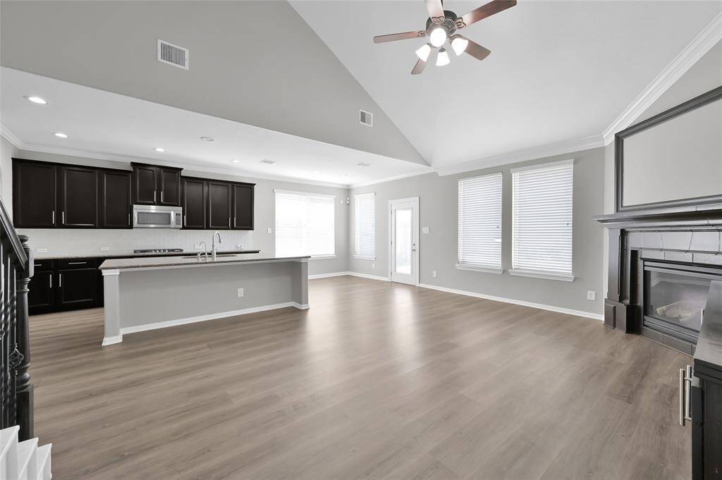 View of Spacious Living Room & Kitchen.