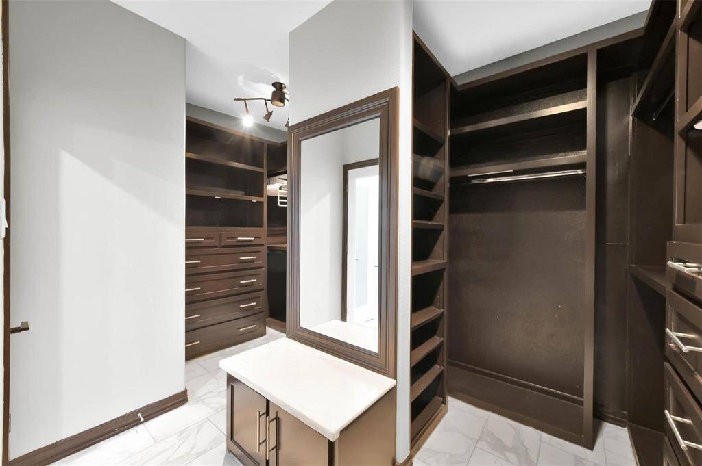 Spacious Master Closet.