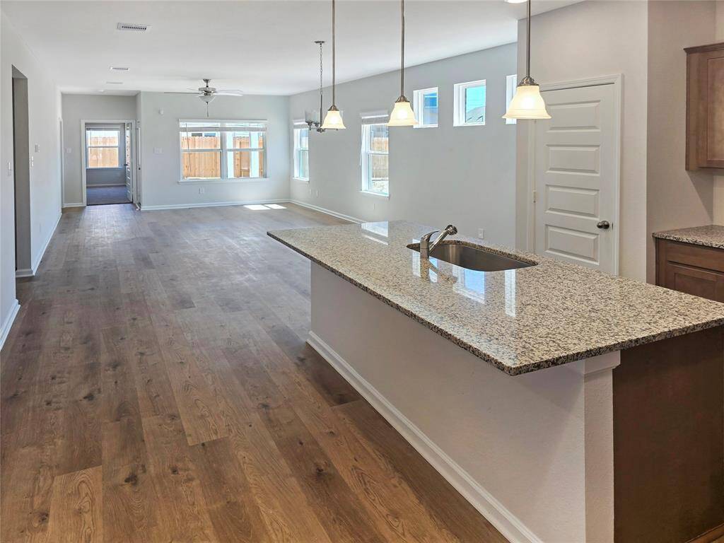 The Oakshire II- Kitchen into the Family Room.