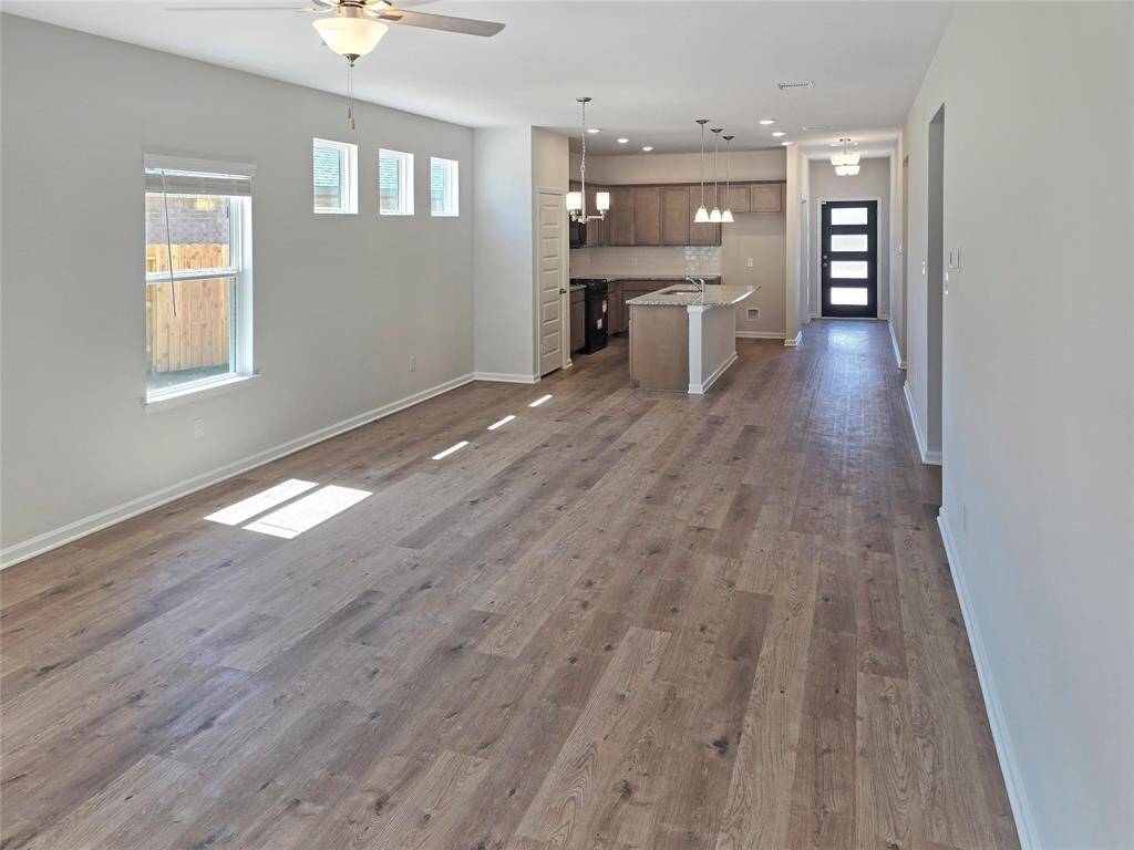 The Oakshire II- Family Room into the Kitchen.