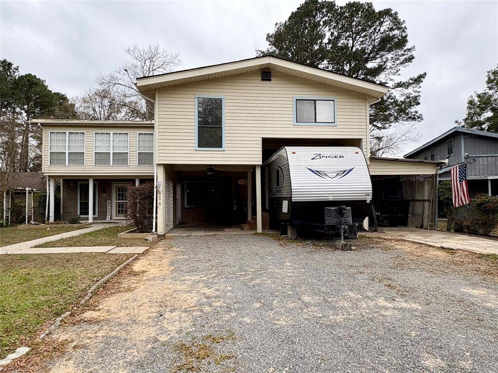 Front of Home with attached 2 Carport