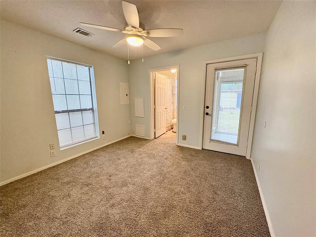 Extra Room with Full Bathroom & back door goes to a Sun Room