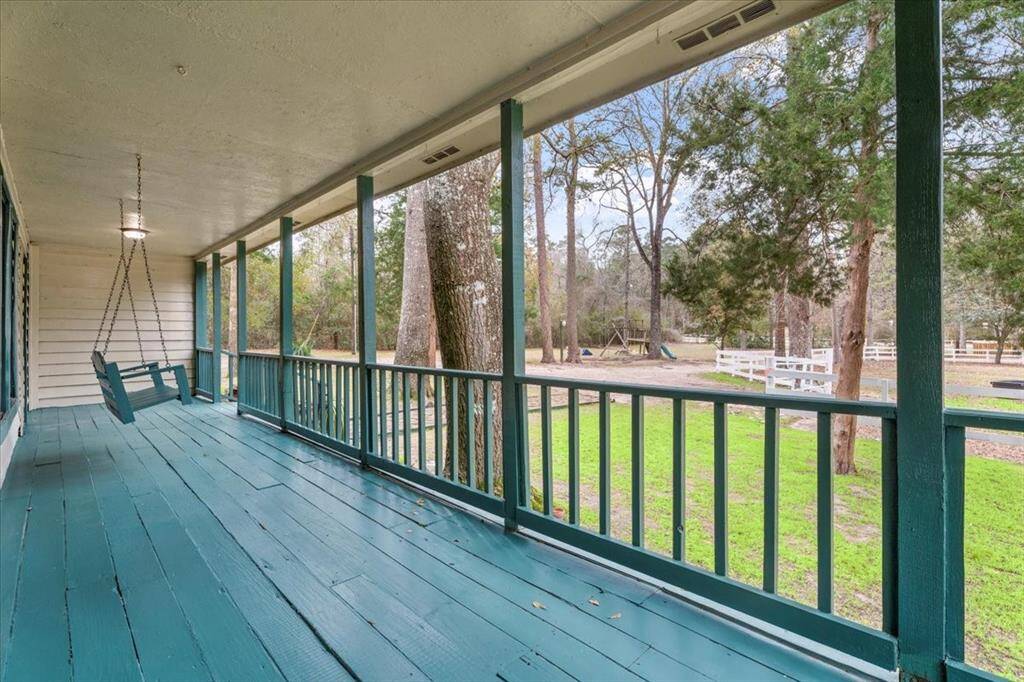 Huge front porch that wraps around home!