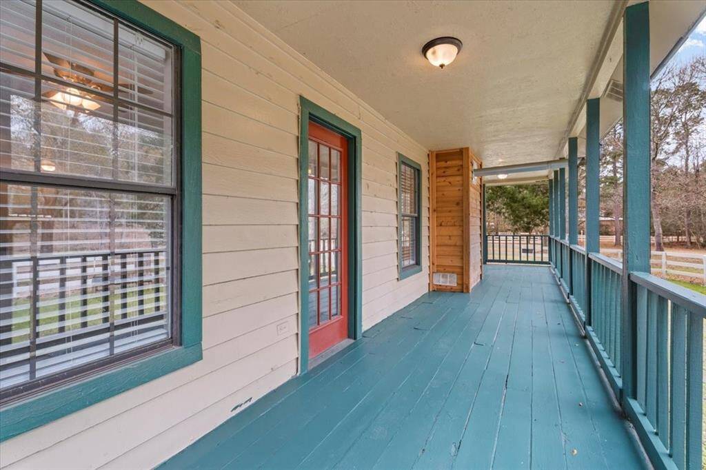 Right side of wrap around porch with 2nd entrance to the dining room area...
